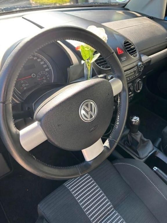 Gebraucht VW New Beetle 102 PS (75 kW) 2009 Blau Kleinwagen