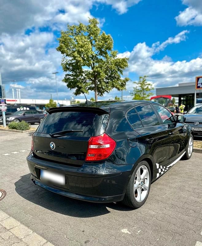 Second-hand BMW 116 116 CP (85 kW) 2009 Negru Hatchback