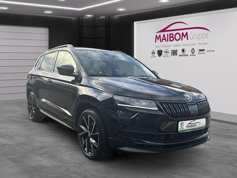 Schwarzmagic perleffekt Gebraucht 2019 Skoda Karoq SportLine SUV | 27.490 € (Fairer Preis) - Bild 1/3