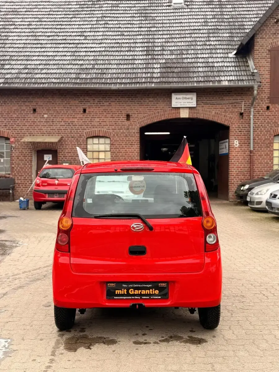 Gebraucht Daihatsu Cuore 69 PS (50 kW) 2010 Rot Kleinwagen