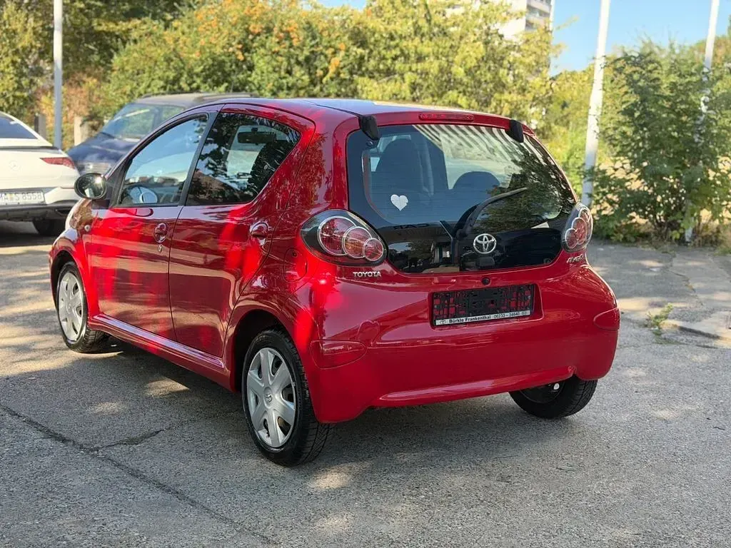 Gebraucht Toyota Aygo Cool 68 PS (50 kW) 2011 Rot Kleinwagen