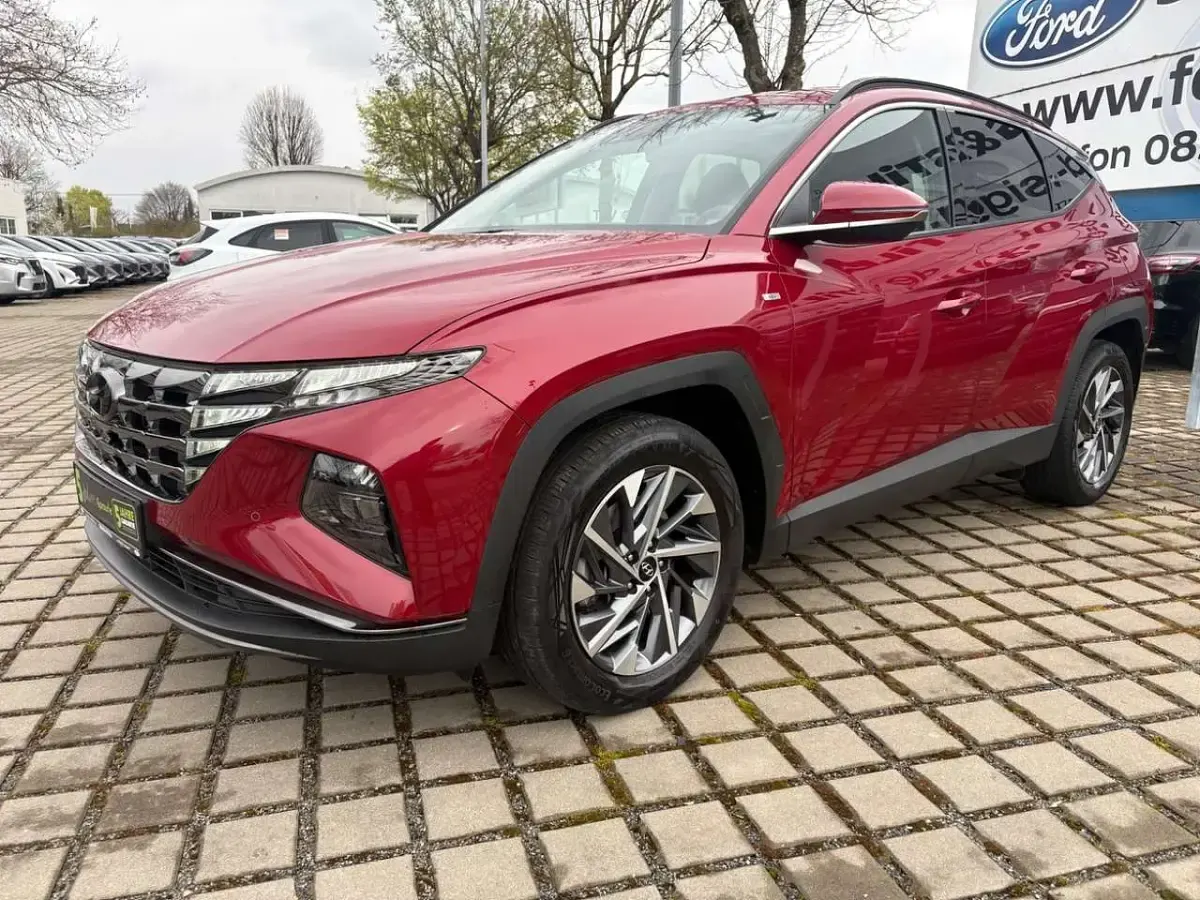 Gebraucht Hyundai Tucson Trend 150 PS (110 kW) 2021 Sunset red metallic SUV