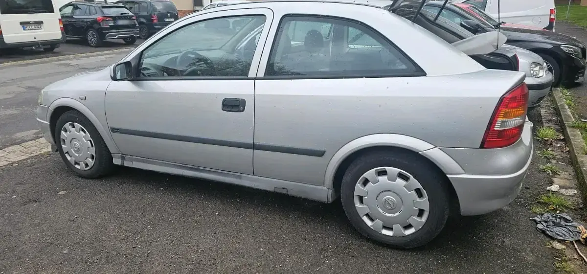 Second-hand Opel Astra 86 CP (63 kW) 2001 Argintiu Coupe