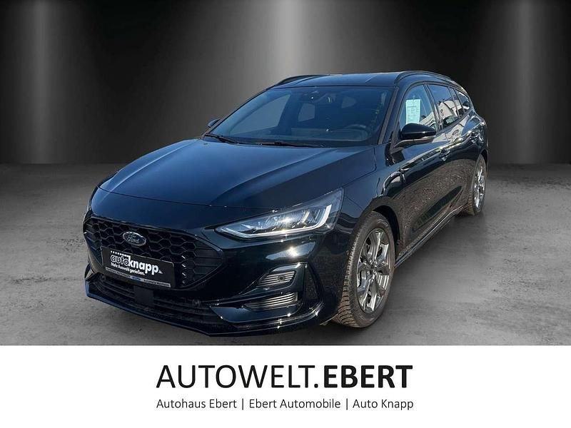 Obsidianschwarz Gebraucht 2024 Ford Focus ST-Line Kombi | 23.890 € (Superpreis) - Bild 1/4