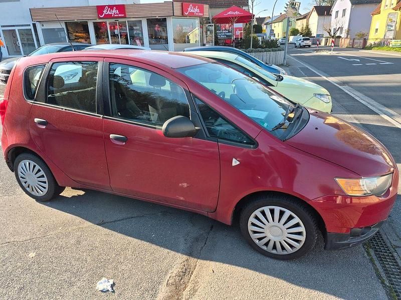 Gebraucht Mitsubishi Colt 95 PS (69 kW) 2009 Rot Kleinwagen