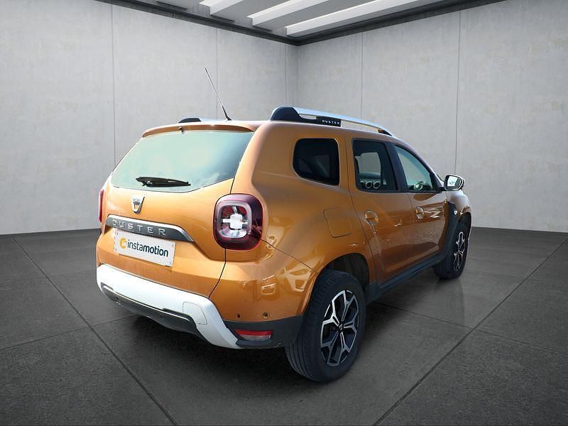 Second-hand Dacia Duster 101 CP (74 kW) 2021 Portocaliu SUV