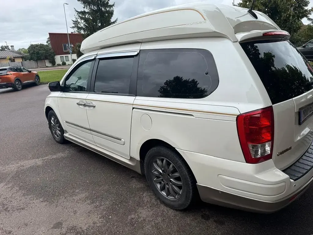 Gebraucht Kia Carnival 197 PS (144 kW) 2010 Weiß Van / Kleinbus