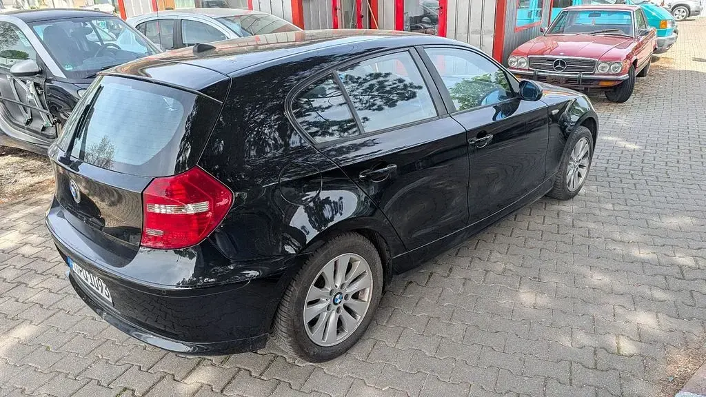 Używany BMW 116 122 KM (89 kW) 2008 Czarny Hatchback