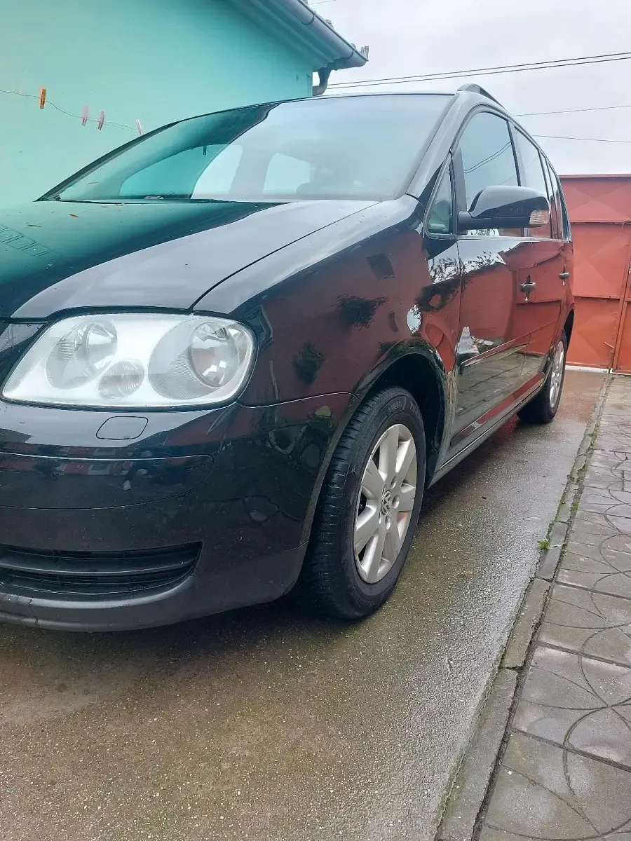 Używany VW Touran 105 KM (77 kW) 2006 Czarny Minivan