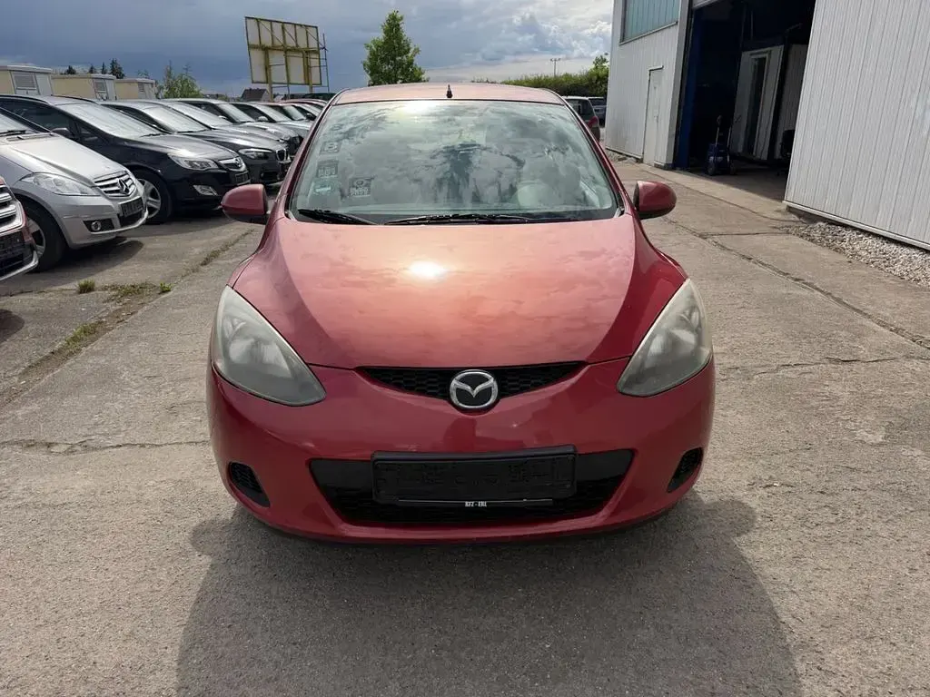 Gebraucht Mazda 2 Independence 86 PS (63 kW) 2009 Rot Kleinwagen