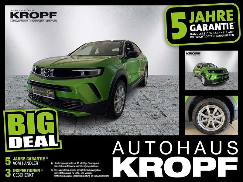 Gebraucht Opel Mokka-e Elegance 100 kW (136 PS) 2023 Lackierung matcha green/typ au SUV