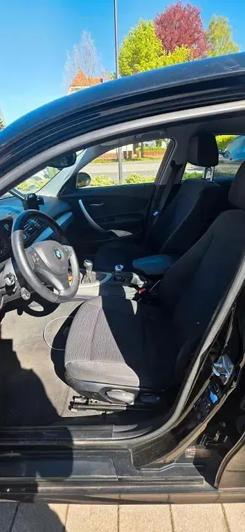 Gebraucht BMW 116 122 PS (89 kW) 2009 Schwarz Kleinwagen