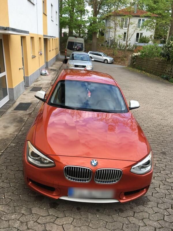 Orange Gebraucht 2012 BMW 120 Lifestyle Kleinwagen | 10.000 € - Bild 1/4