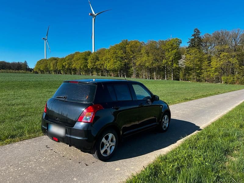 Second-hand Suzuki Swift 92 CP (67 kW) 2008 Negru Hatchback