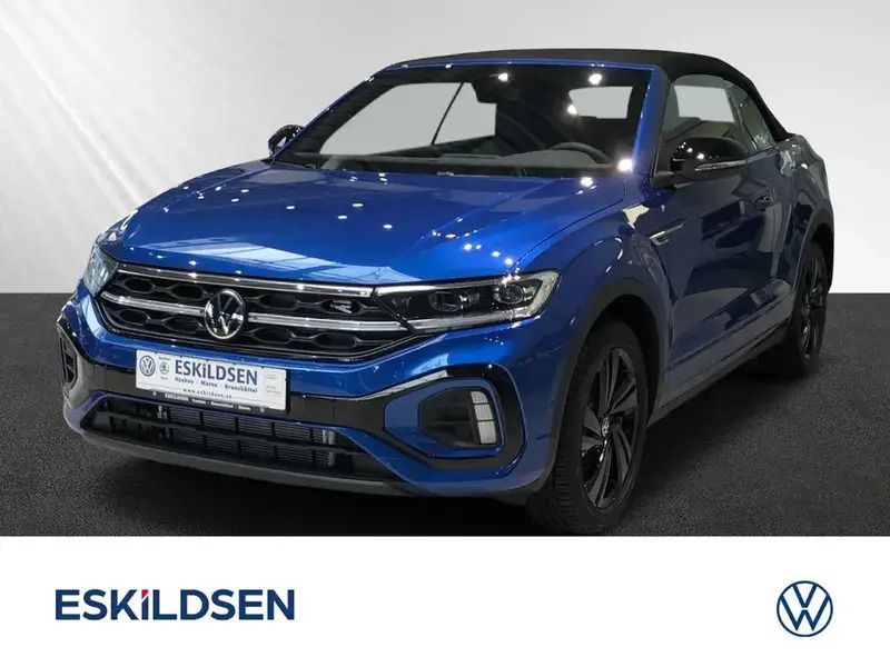 Ravennablau schwarz Gebraucht 2024 VW T-Roc R-line SUV | 40.990 € - Bild 1/4