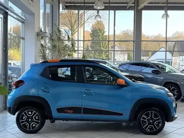 Gebraucht Dacia Spring Comfort Plus 50 kW (68 PS) 2022 Morgenbrisenblau Kleinwagen