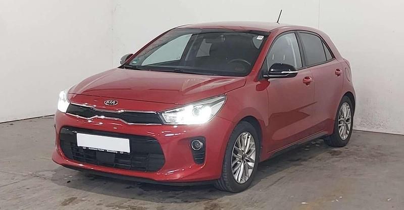 Signal red Gebraucht 2017 Kia Rio DREAM-TEAM Edition Kleinwagen | 9.490 € (Fairer Preis) - Bild 1/4