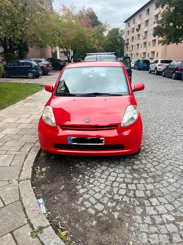 Rot Gebraucht 2007 Daihatsu Sirion Kleinwagen | 1.200 € - Bild 1/4