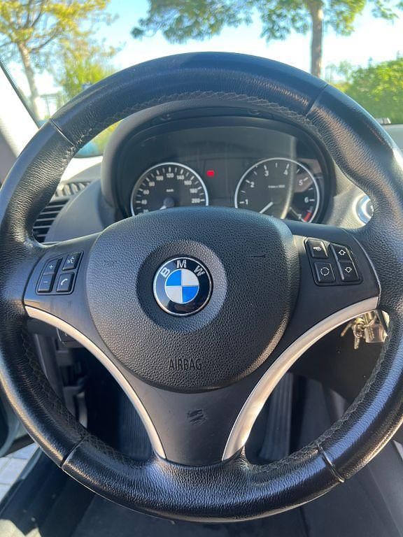 Second-hand BMW 116 122 CP (89 kW) 2007 Verde Hatchback