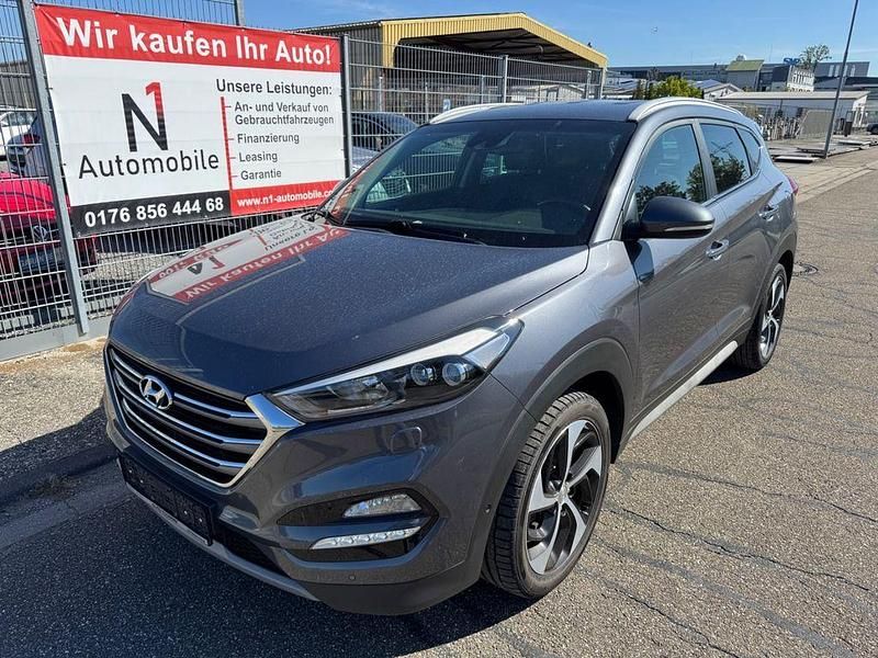 Grau Gebraucht 2017 Hyundai Tucson Premium SUV | 17.990 € (Fairer Preis) - Bild 1/4