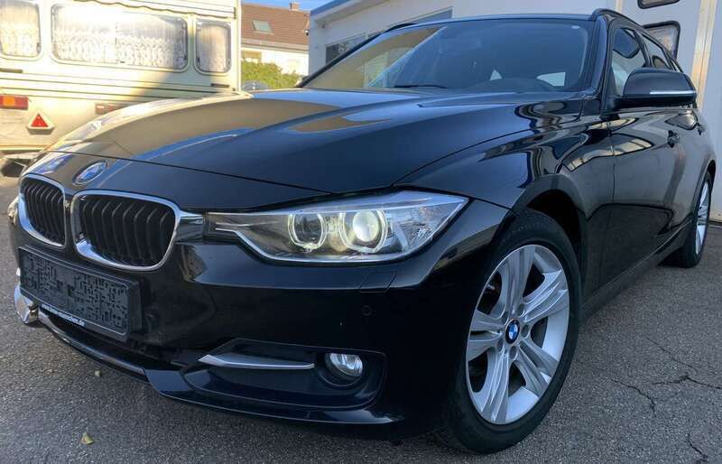 Saphireschwarz Gebraucht 2014 BMW 318 Sport Line Kombi | 10.900 € (Fairer Preis) - Bild 1/4