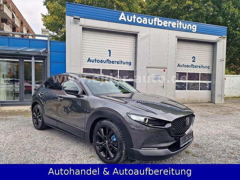 Machine grey Gebraucht 2022 Mazda CX-30 Homura-Line SUV | 23.750 € (Fairer Preis) - Bild 1/4