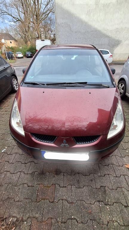 Rot Gebraucht 2005 Mitsubishi Colt Van / Kleinbus | 550 € - Bild 1/4