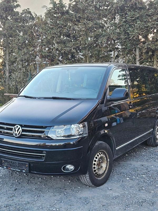 Second-hand VW Caravelle 140 CP (102 kW) 2014 Negru Van