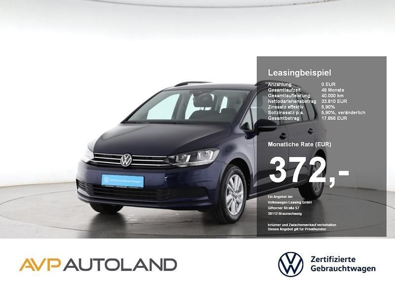 Atlantik blue metallic Gebraucht 2024 VW Touran Comfortline Van / Kleinbus | 33.760 € (Fairer Preis) - Bild 1/4