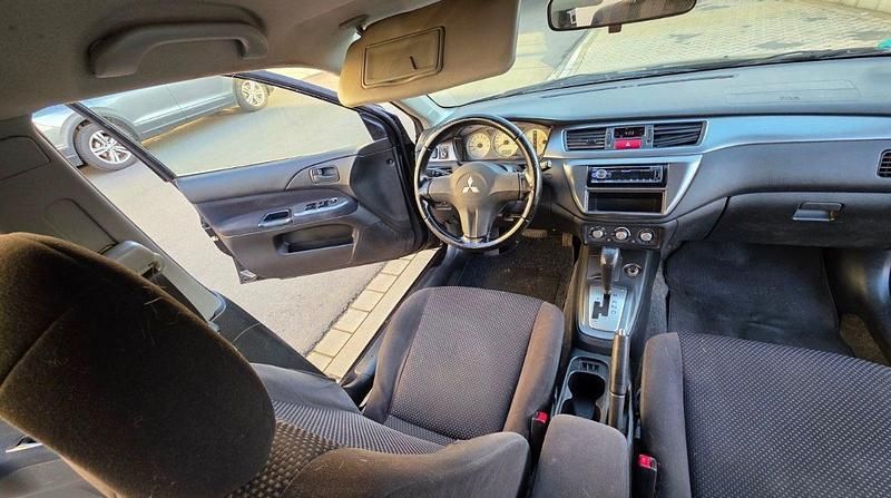 Gebraucht Mitsubishi Lancer Invite 98 PS (72 kW) 2006 Schwarz Kombi