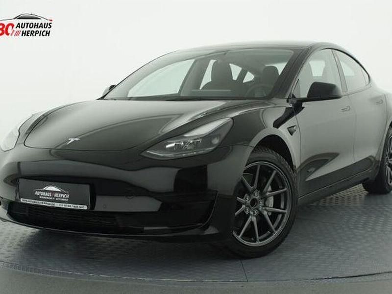 Solid black Gebraucht 2021 Tesla Model 3 Limousine | 21.990 € (Fairer Preis) - Bild 1/4