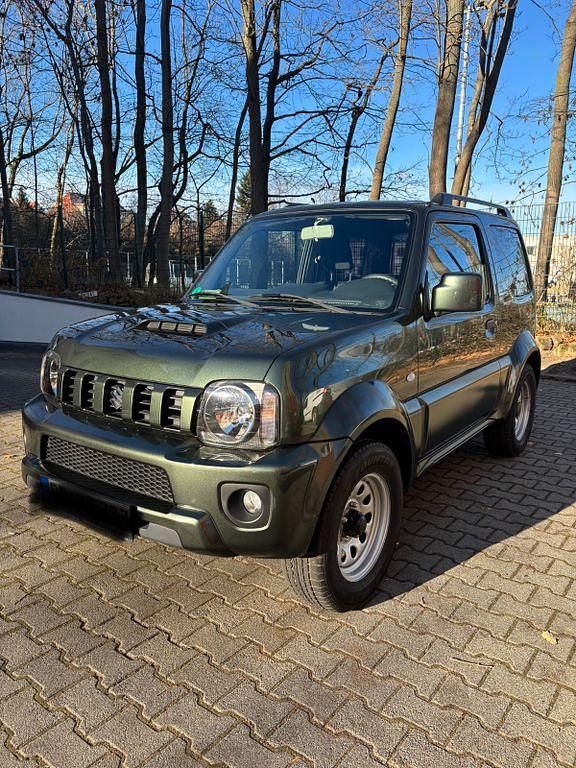 Grün Gebraucht 2017 Suzuki Jimny Comfort SUV | 17.400 € (Fairer Preis) - Bild 1/4