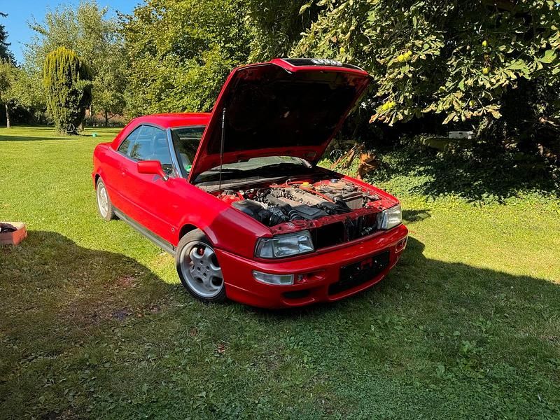 Rot Gebraucht 1991 Audi Cabriolet Basis Cabrio | 10.999 € - Bild 1/4