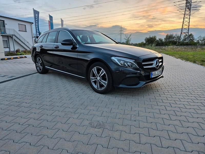Schwarz Gebraucht 2015 Mercedes C180 Kombi | 11.999 € (Fairer Preis) - Bild 1/4