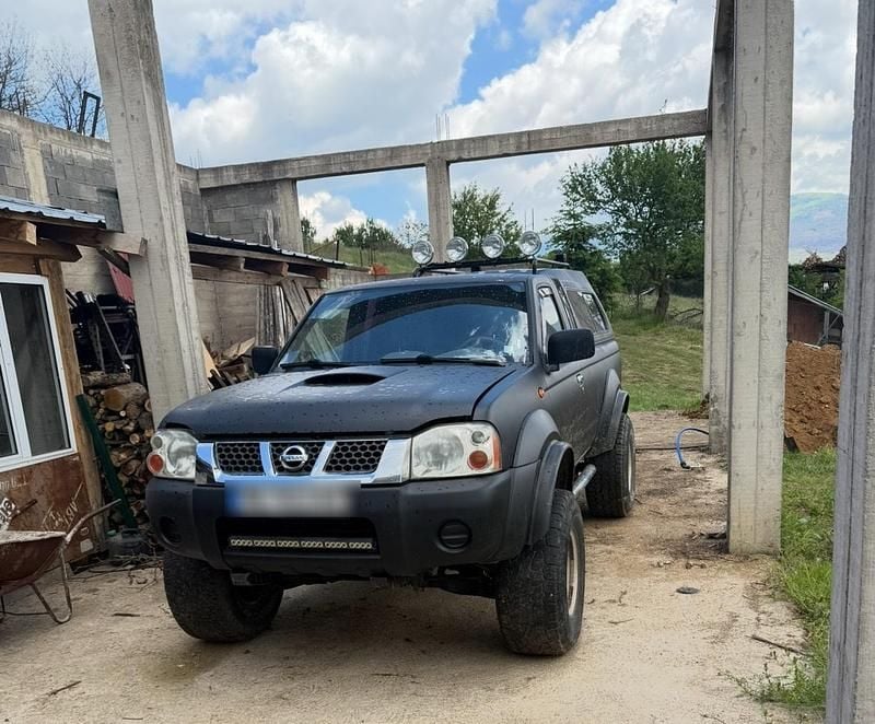 Schwarz Gebraucht 2003 Nissan Navara Abholung | 7.799 € (Teuer) - Bild 1/4