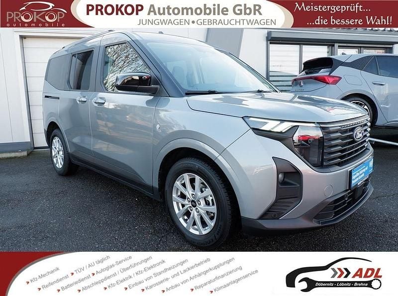 Gebraucht Ford Tourneo Courier Titanium 125 PS (91 kW) 2024 Grau Van / Kleinbus