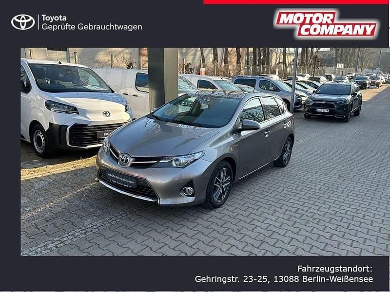 Braun Gebraucht 2015 Toyota Auris Hybrid Edition Limousine | 12.815 € (Fairer Preis) - Bild 1/4