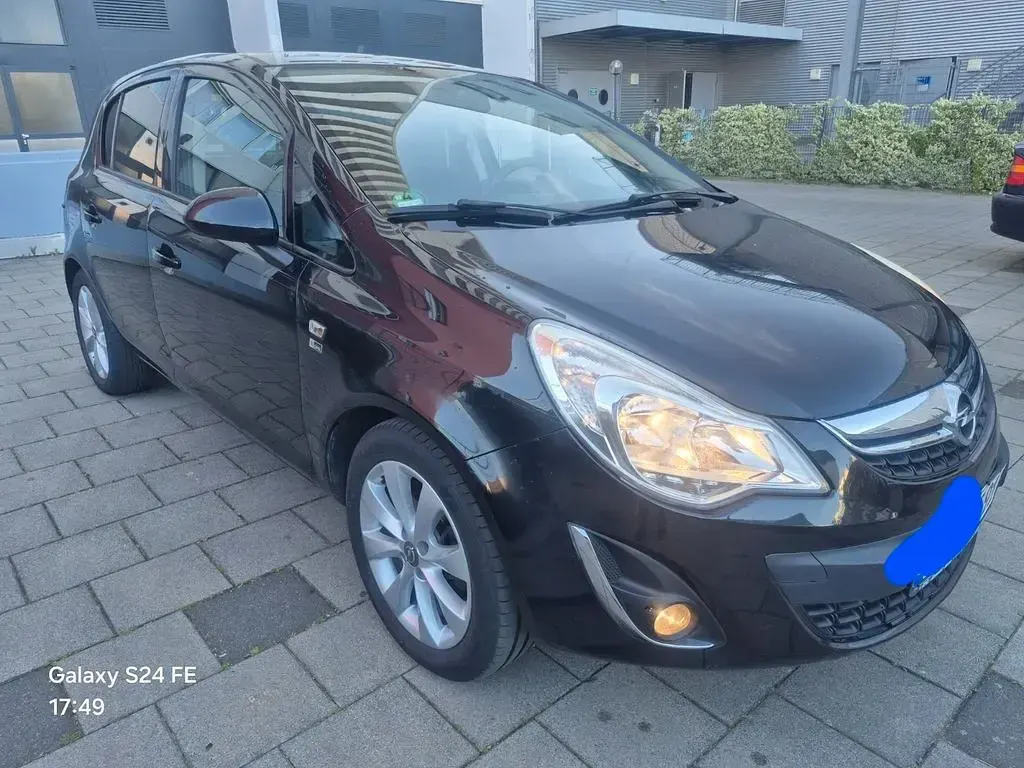 Gebraucht Opel Corsa Active 87 PS (63 kW) 2012 Schwarz Kleinwagen