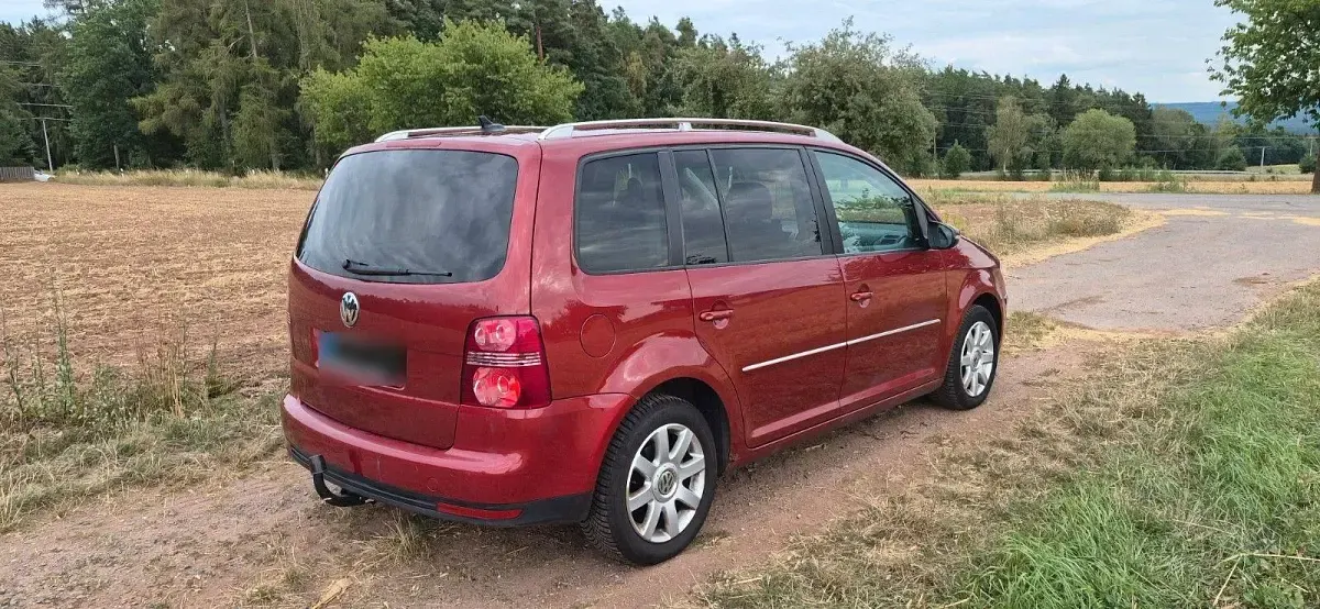Gebraucht VW Touran Highline 140 PS (102 kW) 2009 Rot Van / Kleinbus