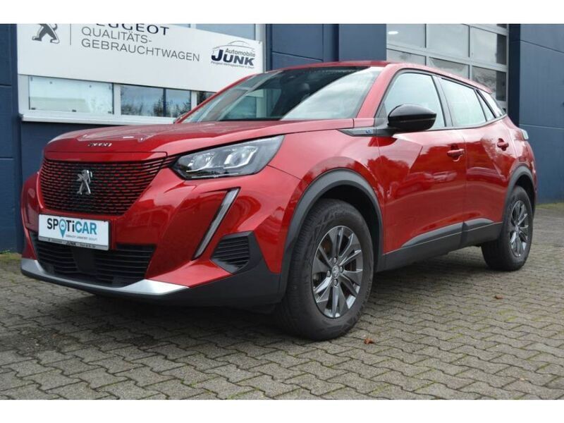 Elexierrotperlmutt (metallic) Gebraucht 2022 Peugeot e-2008 Active SUV | 19.490 € (Fairer Preis) - Bild 1/4