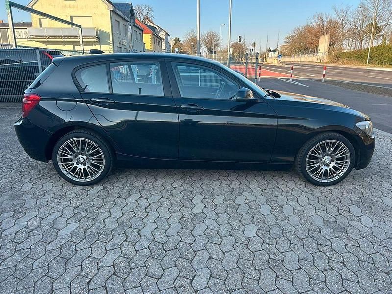 Second-hand BMW 116 116 CP (85 kW) 2012 Negru Hatchback