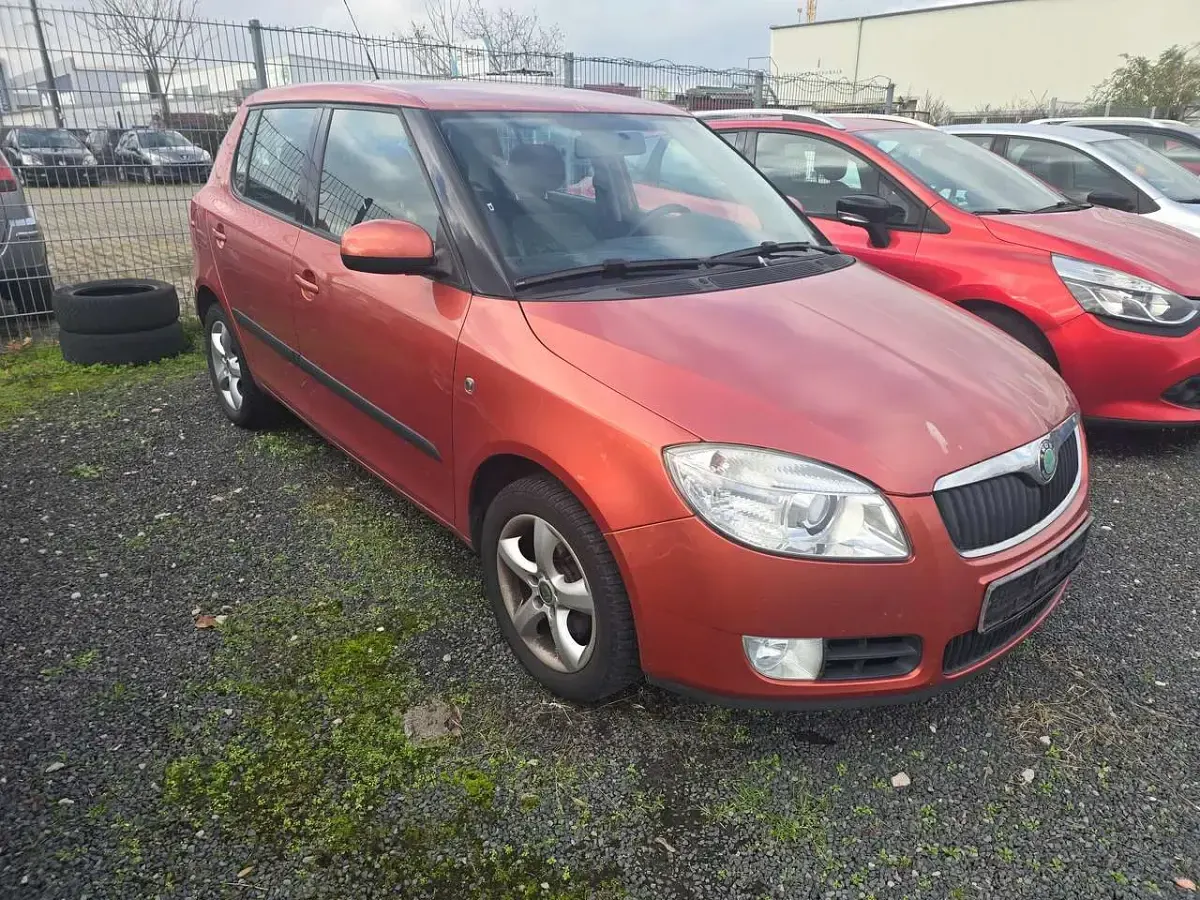 Gebraucht Skoda Fabia Style 69 PS (50 kW) 2009 Orangetangerine metallic Kleinwagen