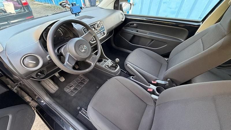 Usado VW up! 59 CV (43 kW) 2012 Negro Utilitario