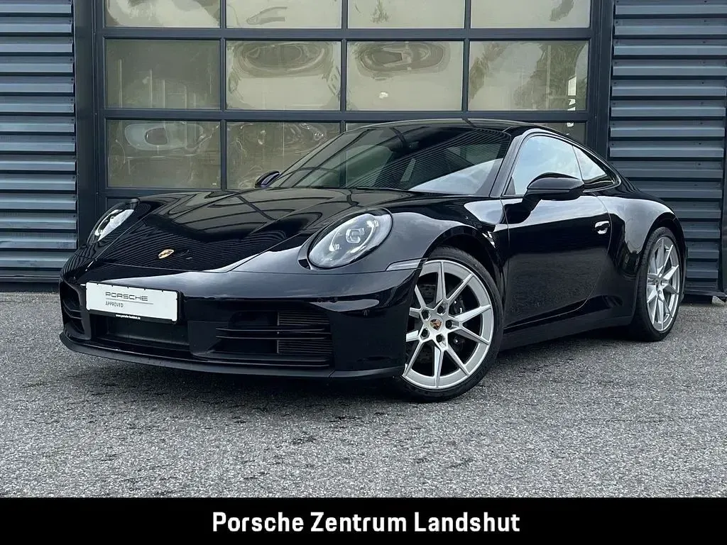 Gebraucht Porsche 911 Carrera 394 PS (289 kW) 2025 Tiefschwarzmetallic Coupé