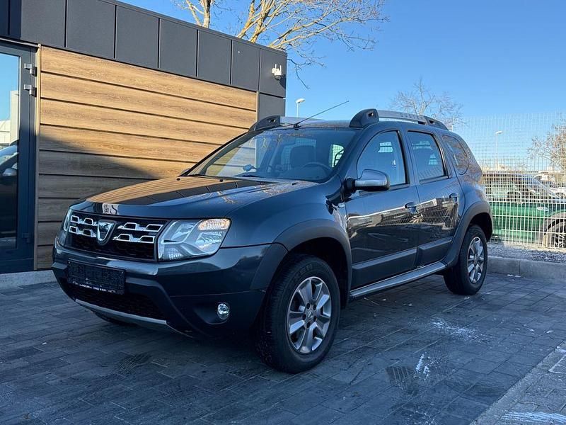 Grau Gebraucht 2015 Dacia Duster Prestige SUV | 8.900 € (Fairer Preis) - Bild 1/4