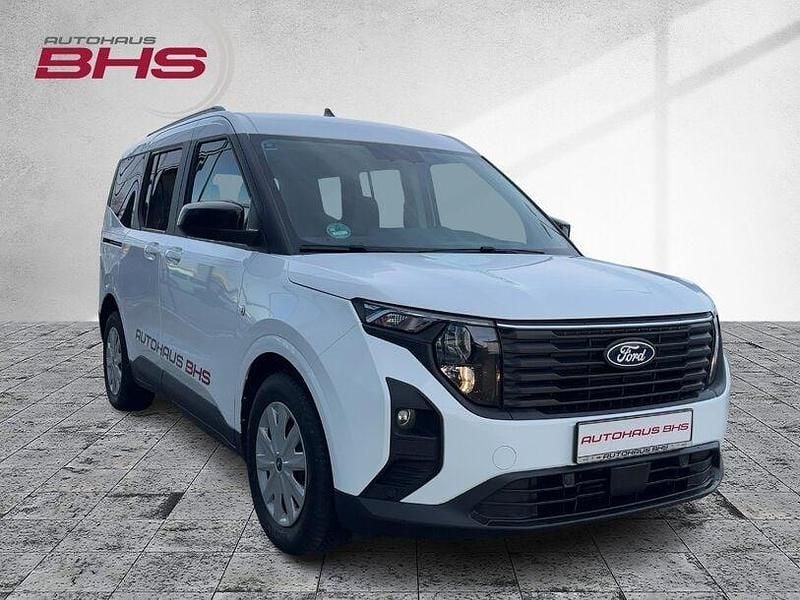 Gebraucht Ford Tourneo Courier Titanium 125 PS (91 kW) 2024 Frostweiss (weiß) Van / Kleinbus