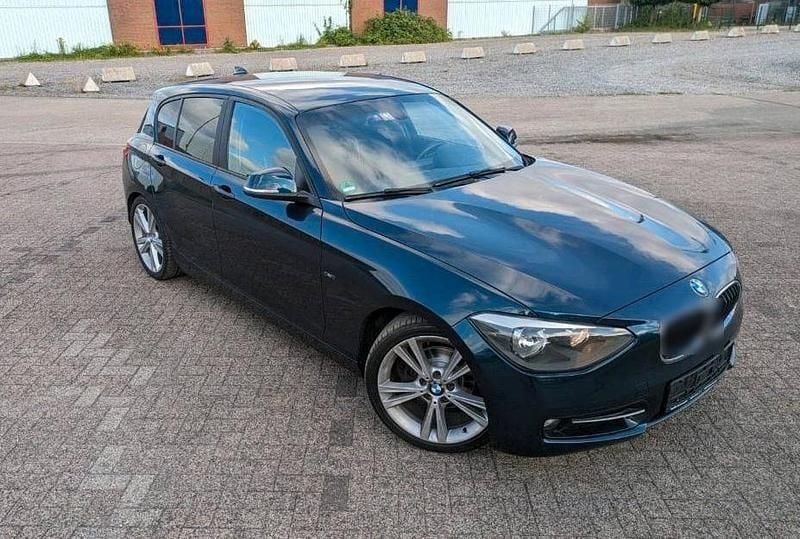 Blau Gebraucht 2012 BMW 116 Sport Line Kleinwagen | 10.650 € - Bild 1/4