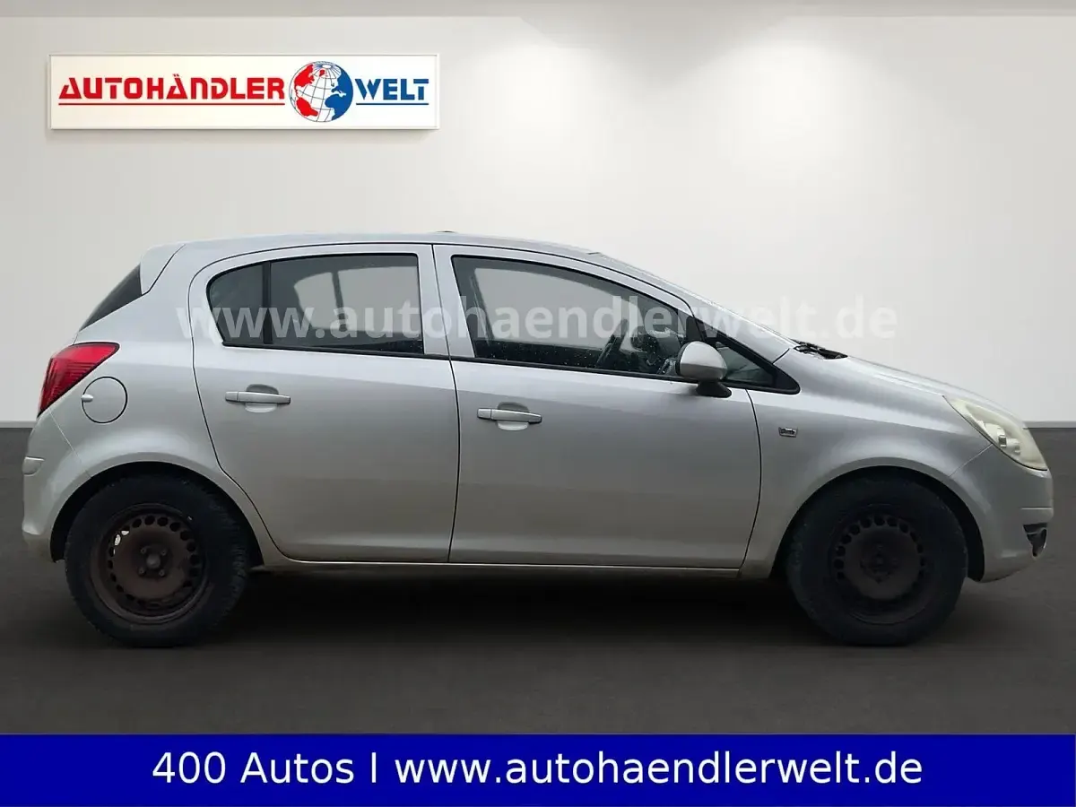 Usado Opel Corsa 80 HP (58 kW) 2009 Cinzento Citadino