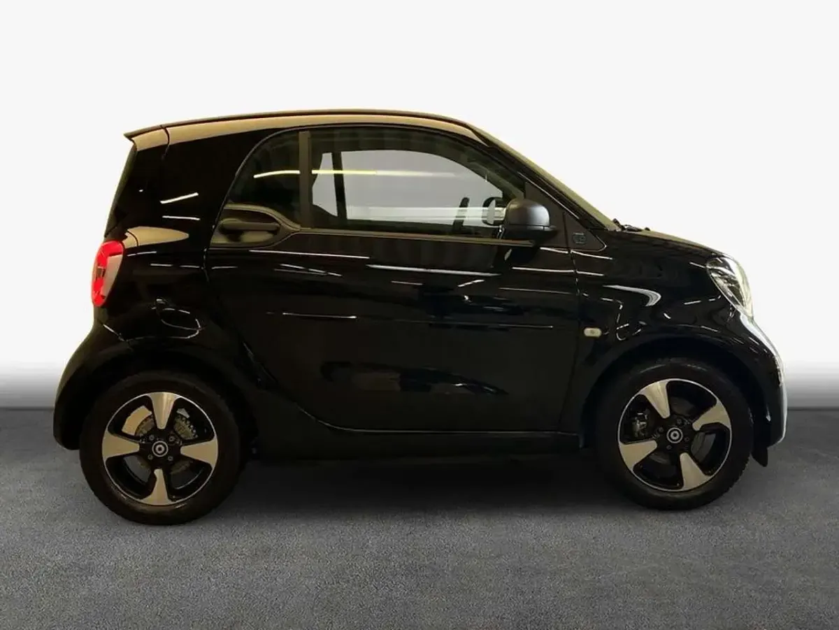 Gebraucht Smart ForTwo Coupé Passion Exclusive 60 kW (82 PS) 2024 Bodypanels in black/tridion sc Kleinwagen