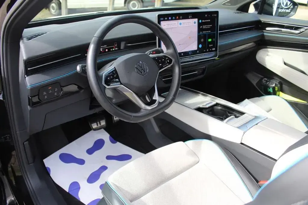 Gebraucht VW ID.7 Pro 210 kW (286 PS) 2023 Grenadillschwarz (metallic) Kleinwagen